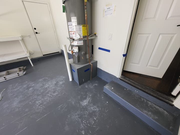 EMS crew documenting moisture damage in the garage, Rancho Cucamonga, CA.