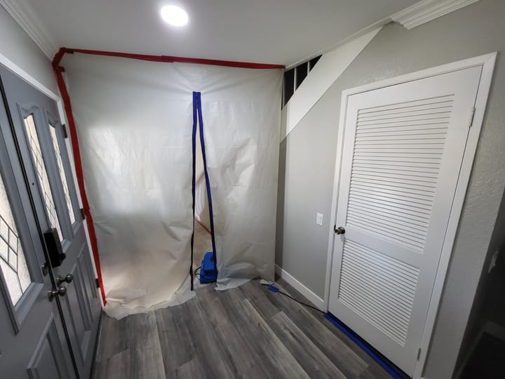 Flood cut demolition in the entry, Riverside, CA.
