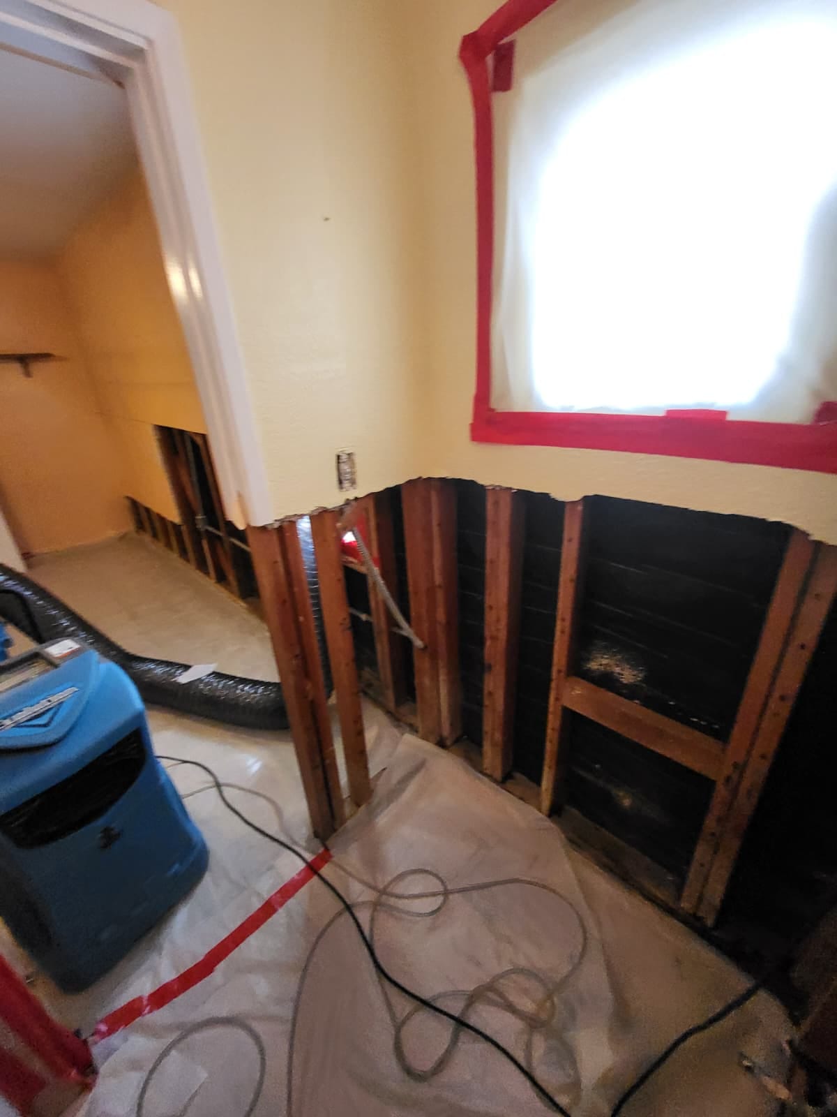 Mold remediation and drying equipment in the primary bathroom, San Bernardino, CA.