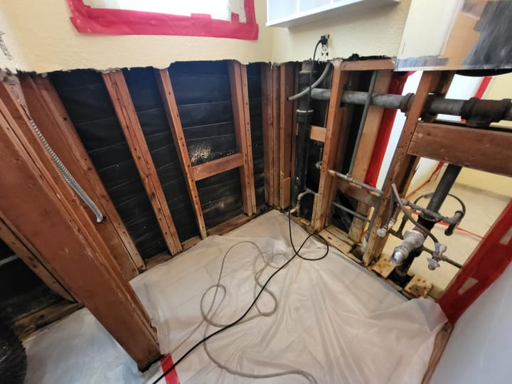 Mold remediation and drying equipment in the primary bathroom, San Bernardino, CA.